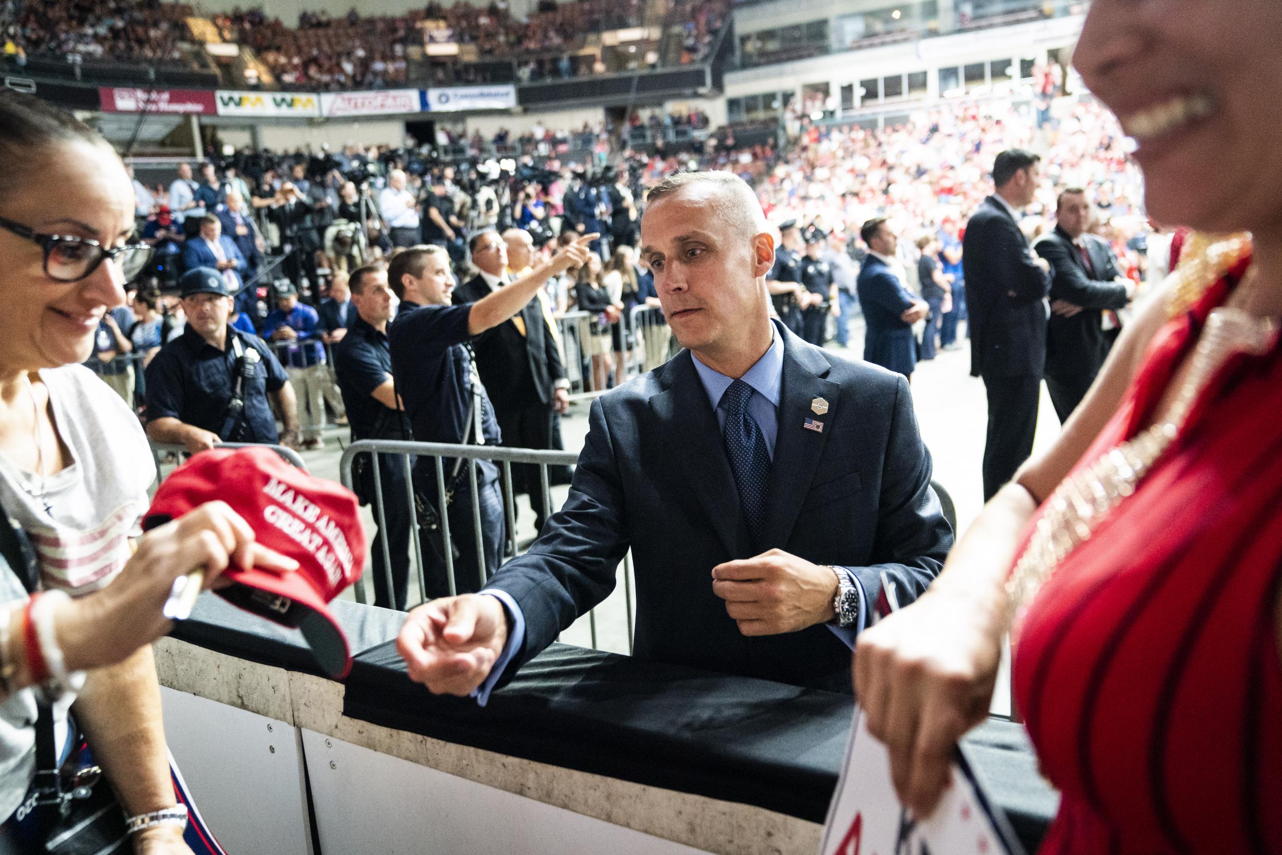 Corey Lewandowski signs autographs during a Trump rally in Manchester, N.H., in August. MUST CREDIT: Washington Post photo by Jabin Botsford.