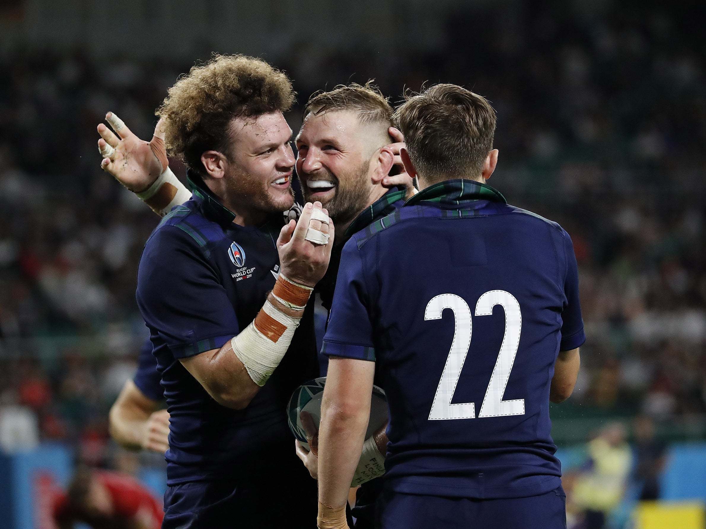 John Barclay celebrates crossing the line for Scotland