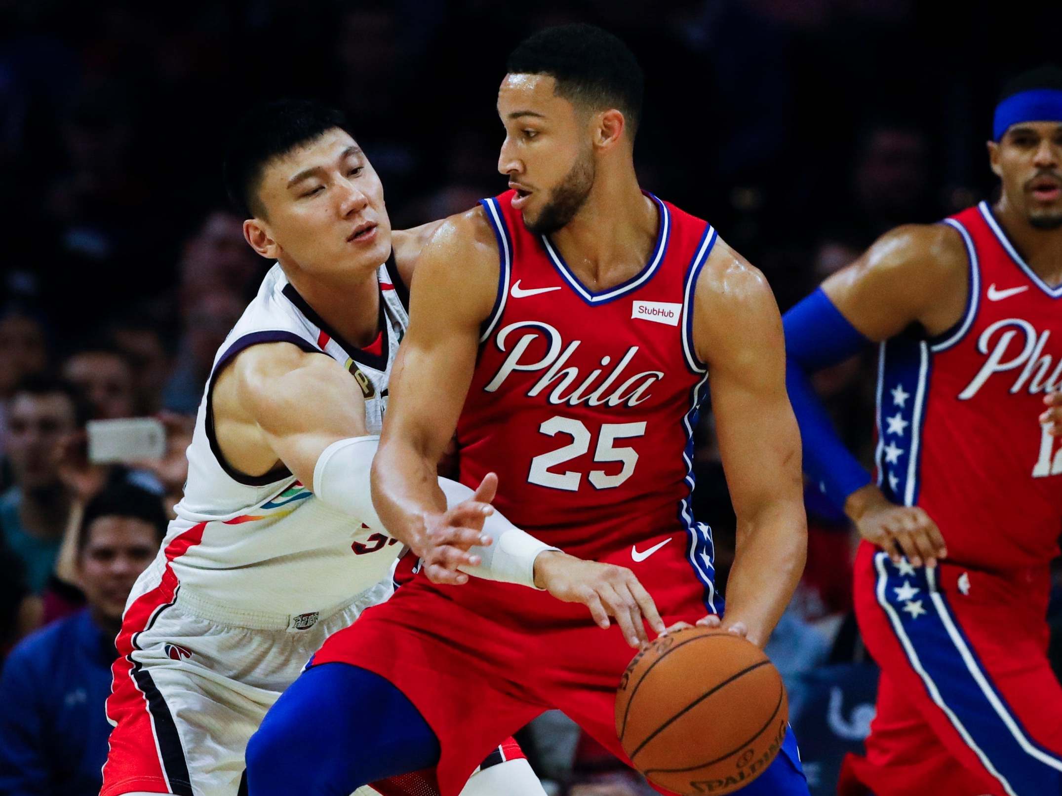 Ben Simmons shields the ball during the pre-season match