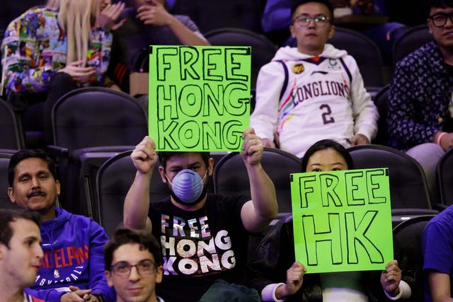Fans at the Philadelphia 76ers NBA game were ejected after holding up pro-demoracy Hong Kong protest signs last week