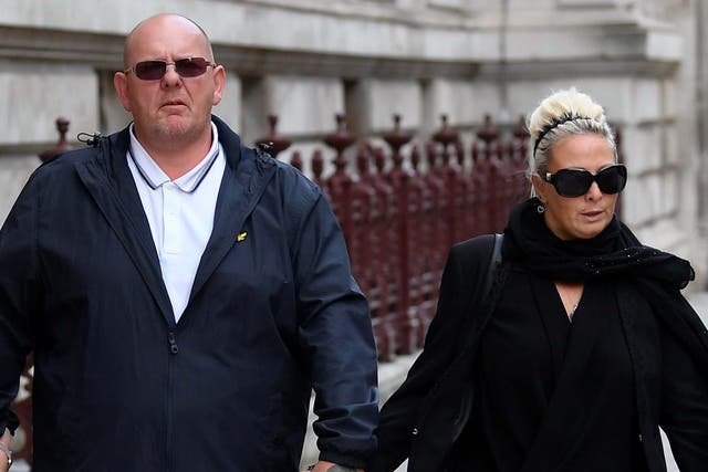 Tim Dunn and Charlotte Charles, parents of Harry Dunn, leave the Foreign and Commonwealth office in London