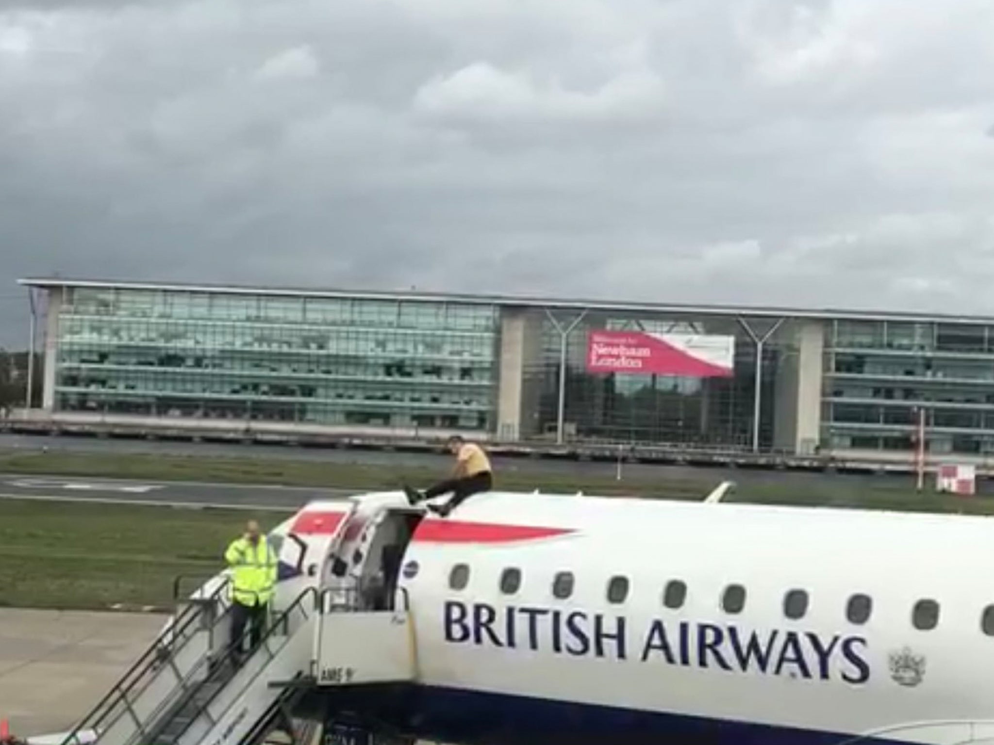 Extinction Rebellion protests: Man climbs on to British Airways plane before take-off as climate activists occupy airport