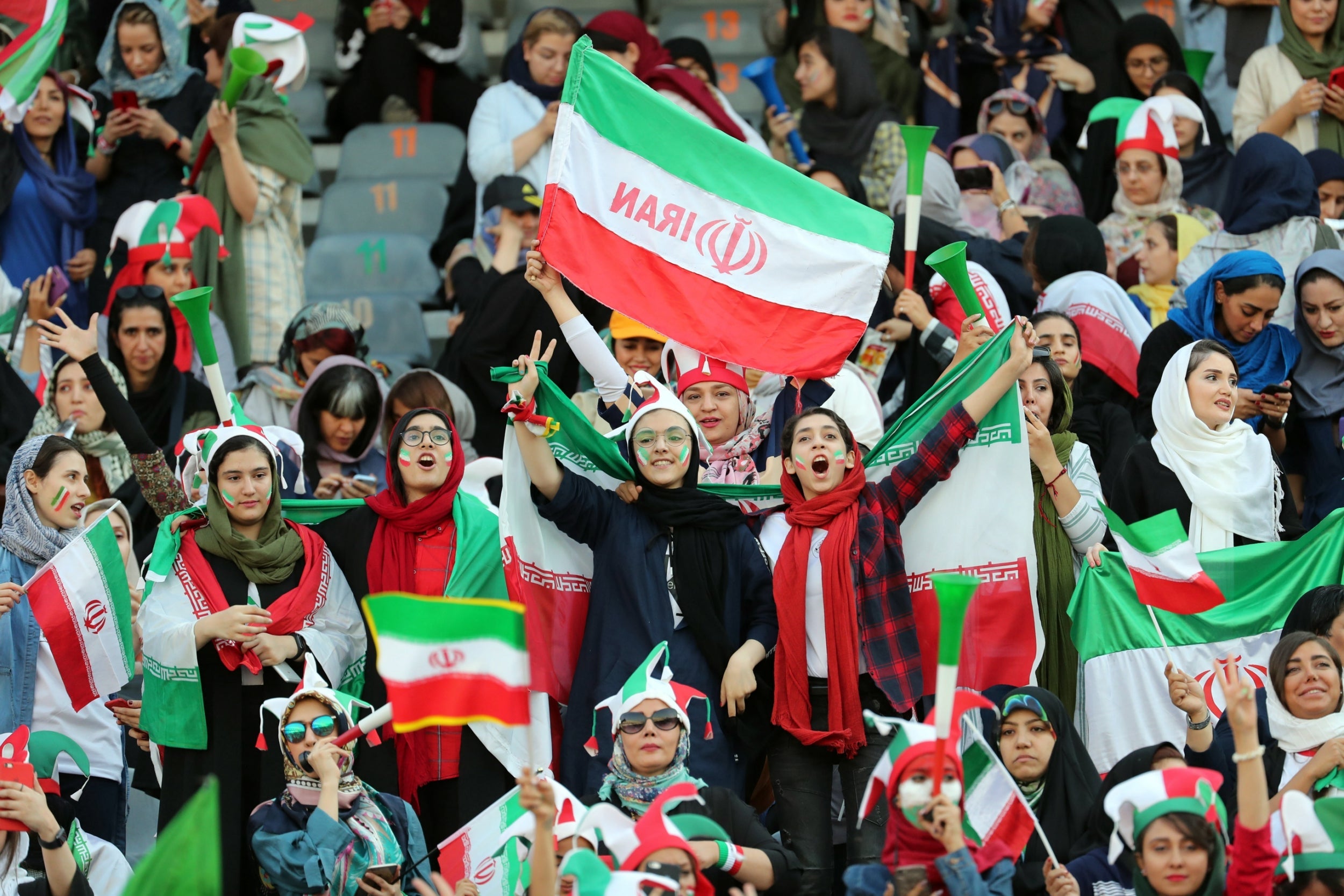 Fans could be seen excitedly waving flags and cheering on their team, who went on to win 14-0 against Cambodia