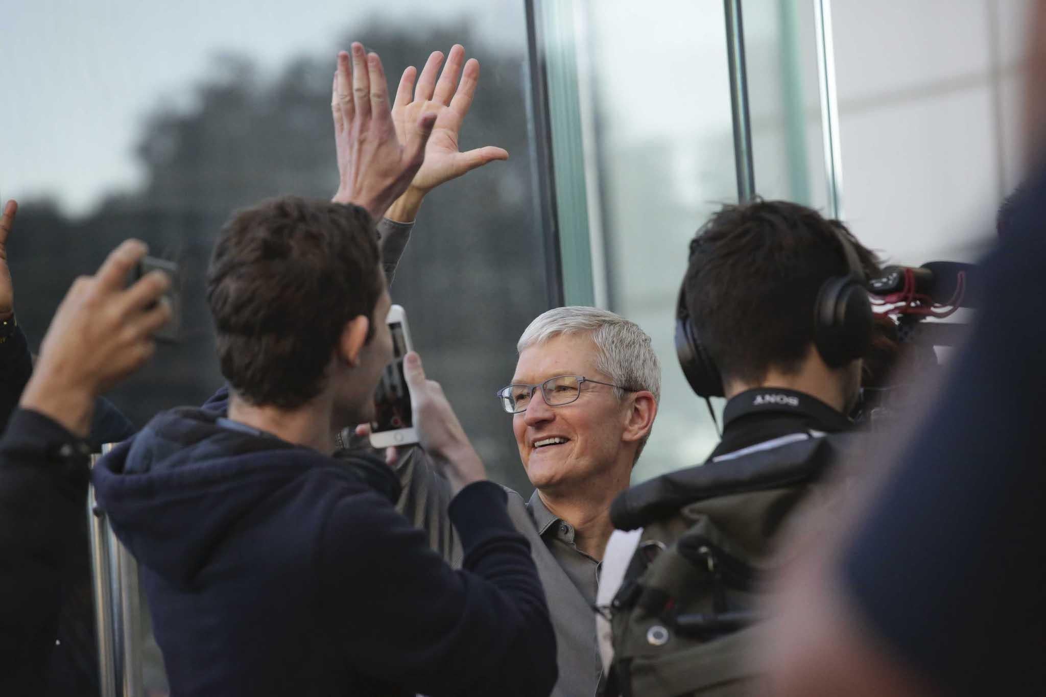 Apple CEO, Tim Cook openS the door of the newly renovated Apple Store at Fifth Avenue on September 20, 2019 in New York City