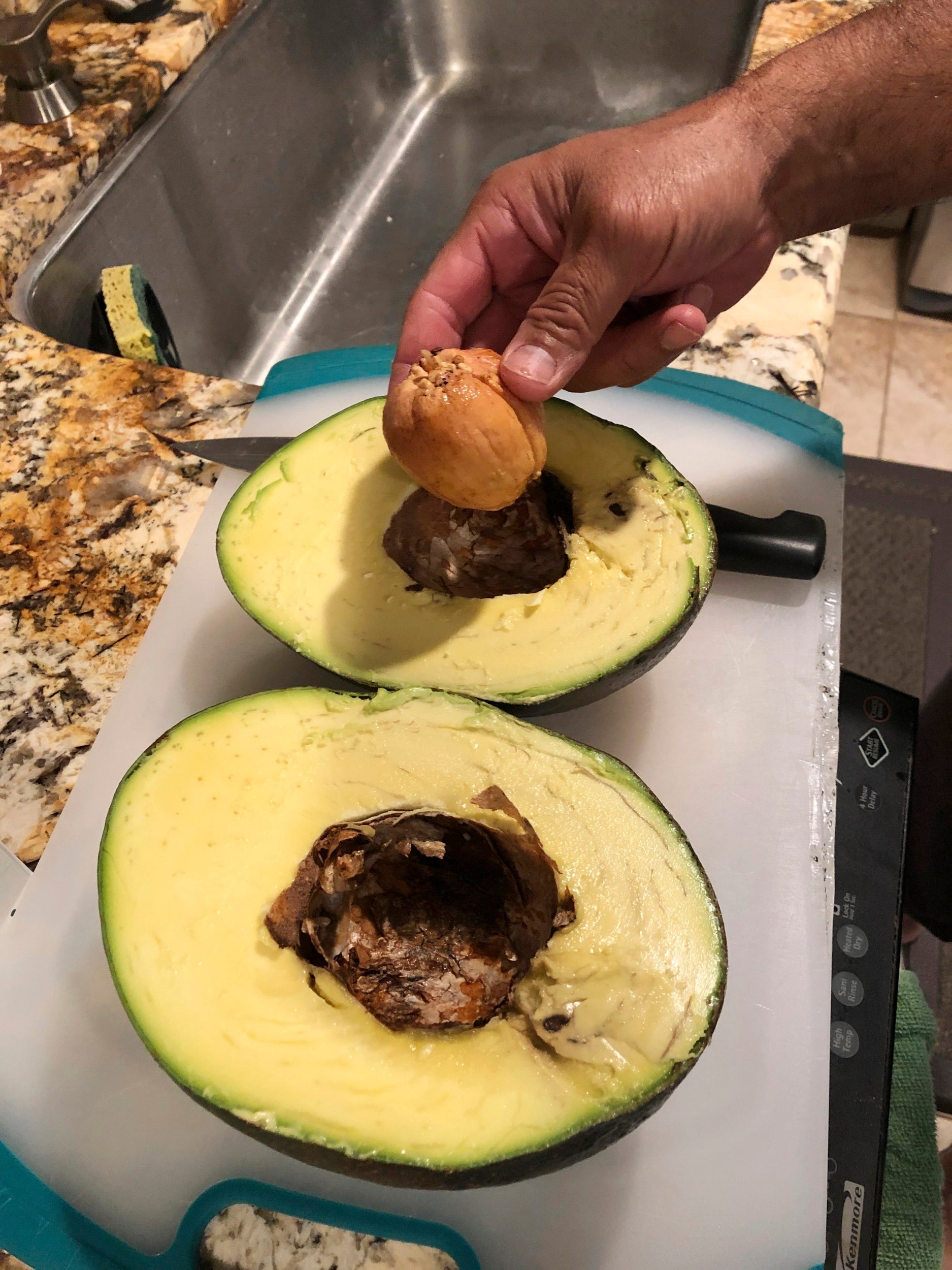 The avocado is cut into to make into guacamole. Photo taken on 13 December 2018