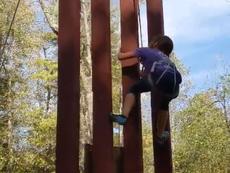 8-year-old girl scales replica of Trump’s ‘un-climbable’ border wall
