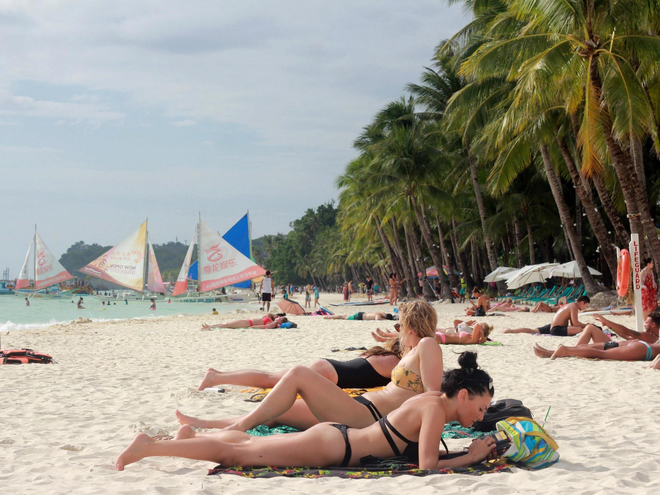 People Beach Sex - Tourist fined for wearing tiny bikini on beach in ...