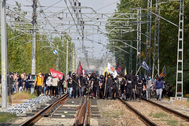 Demonstrators block the railway track of the high speed train AVE to protest against the sentences in Gerona, on Monday