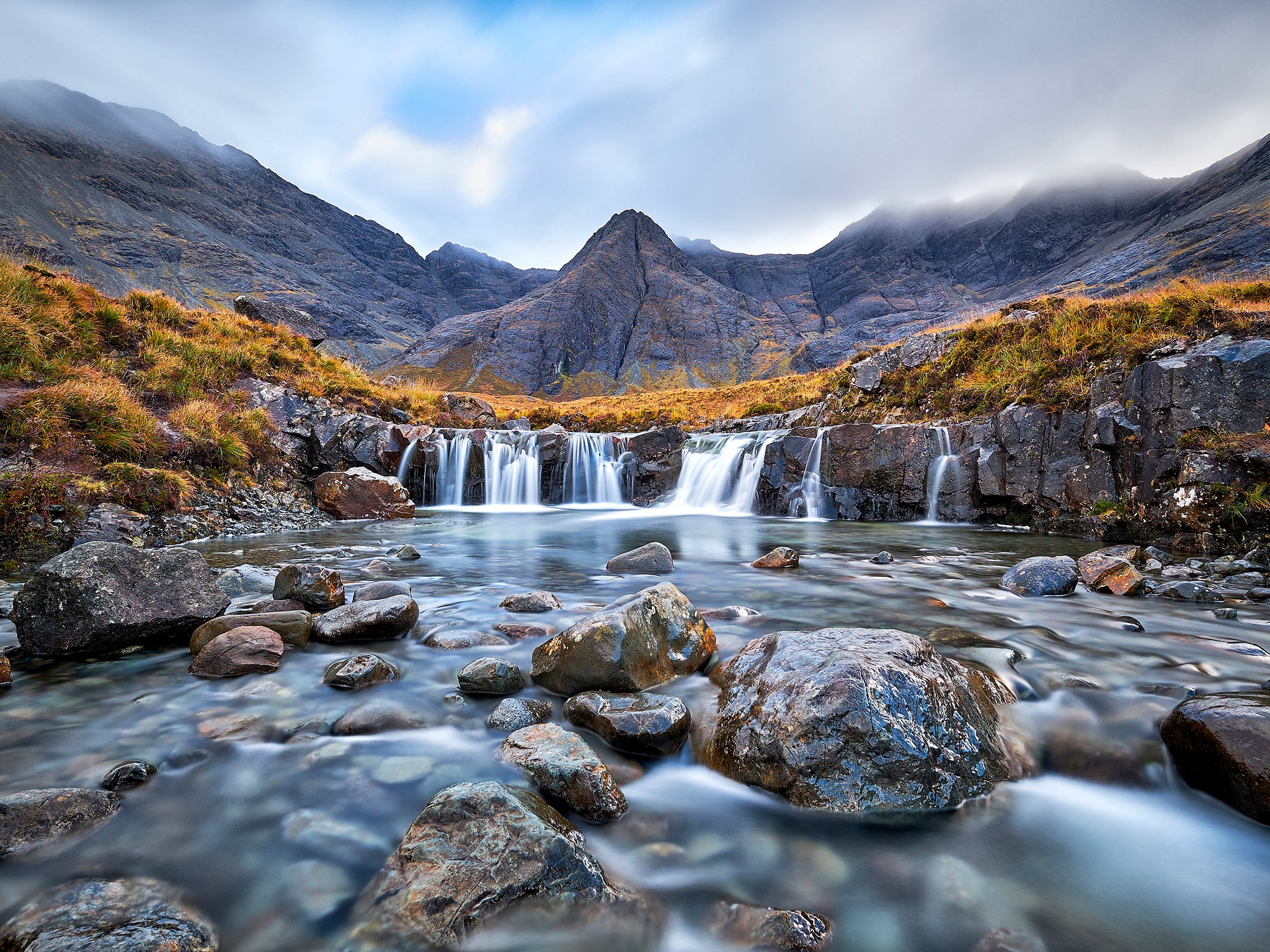 Hikers come from all over the world to look at the supernatural-looking Fairy Pools