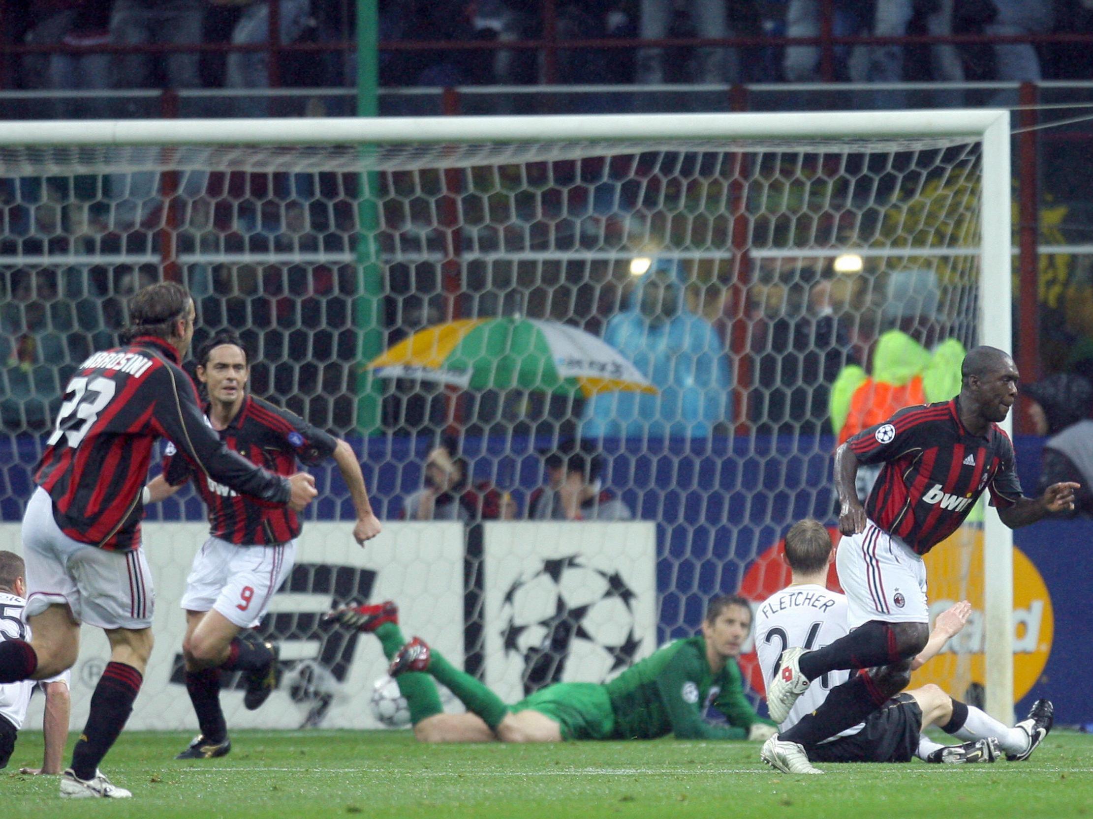 Clarence Seedorf turns to celebrate after scoring vs Manchester United