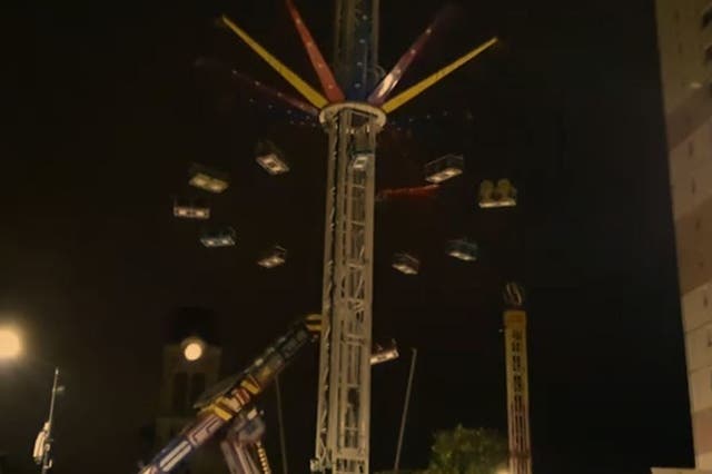 Still image from Télévision Loire 7 (TL7) video of the scene at a fun fair in Firminy, Loire, France, where a 24-year-old woman died after falling from the Sky Flyer swing chair ride on 14 October 2019.