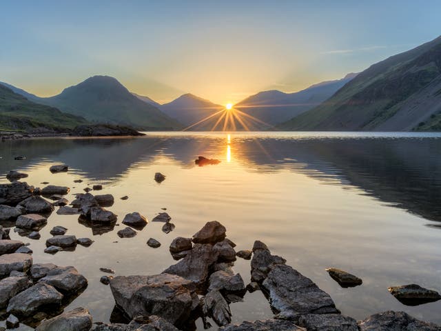 The sun rises at Wastwater, in the Lake District 