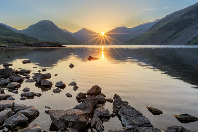 The sun rises at Wastwater, in the Lake District 