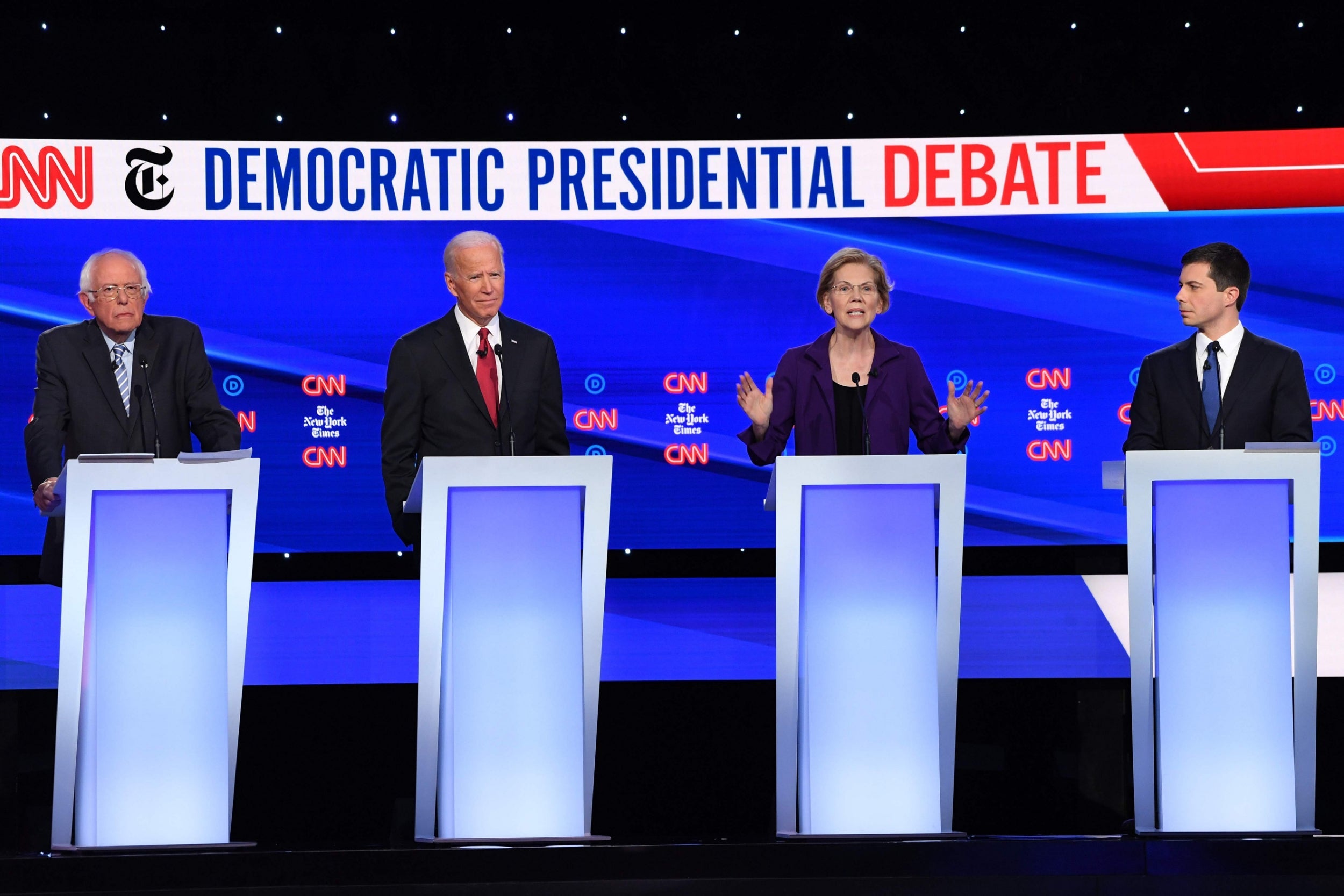 Joe Biden (second left) had a quiet night compared to rival Elizabeth Warren (second right) in Ohio on Tuesday