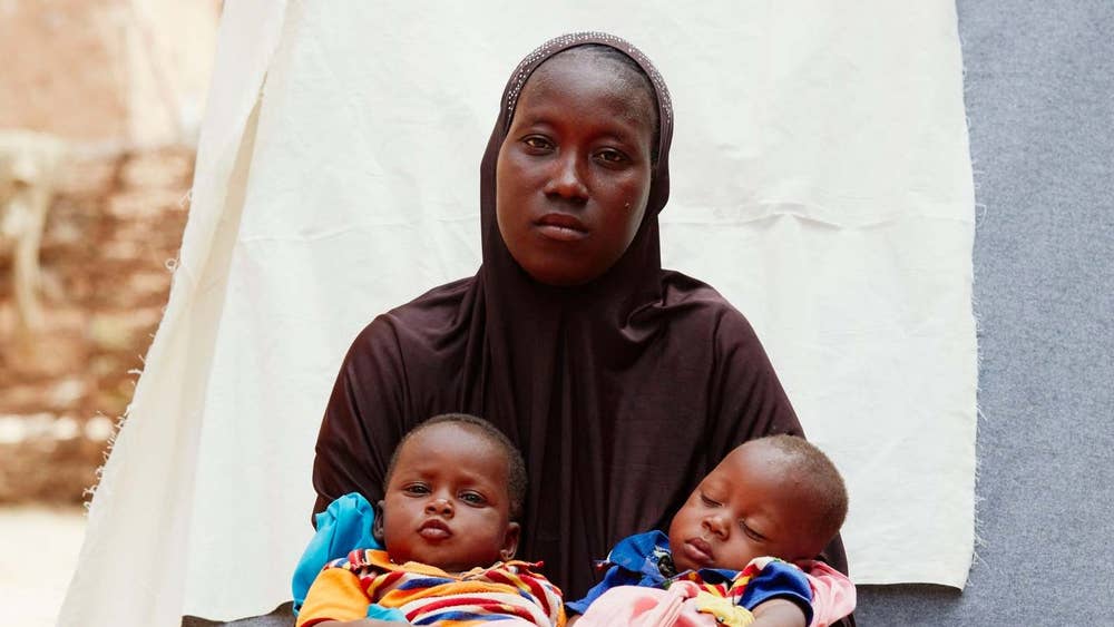 Balkisa Zakow, 25, with her twins Hassan and Ousseni, Tombokiery village, Niger