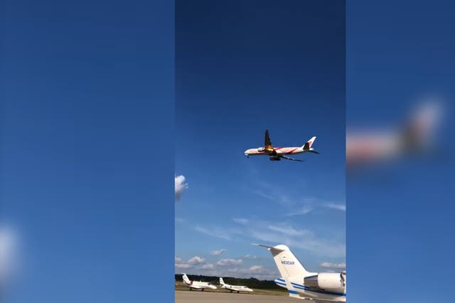 A plane engine started spitting flames shortly after take-off