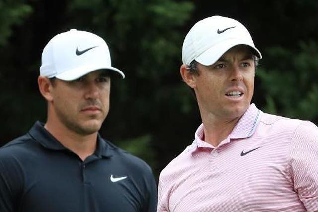 <p>Brooks Koepka and Rory McIlroy at the Tour Championship</p>