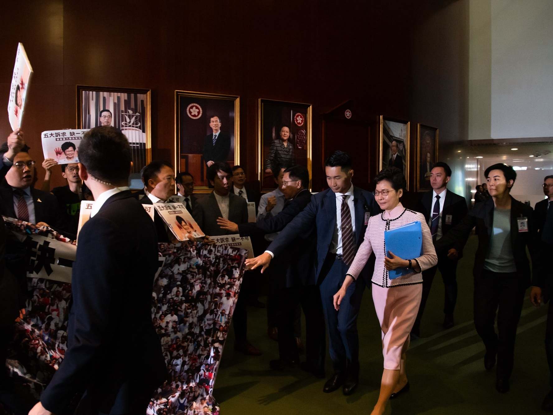 Carrie Lam walks into the chamber to give her annual policy address last October