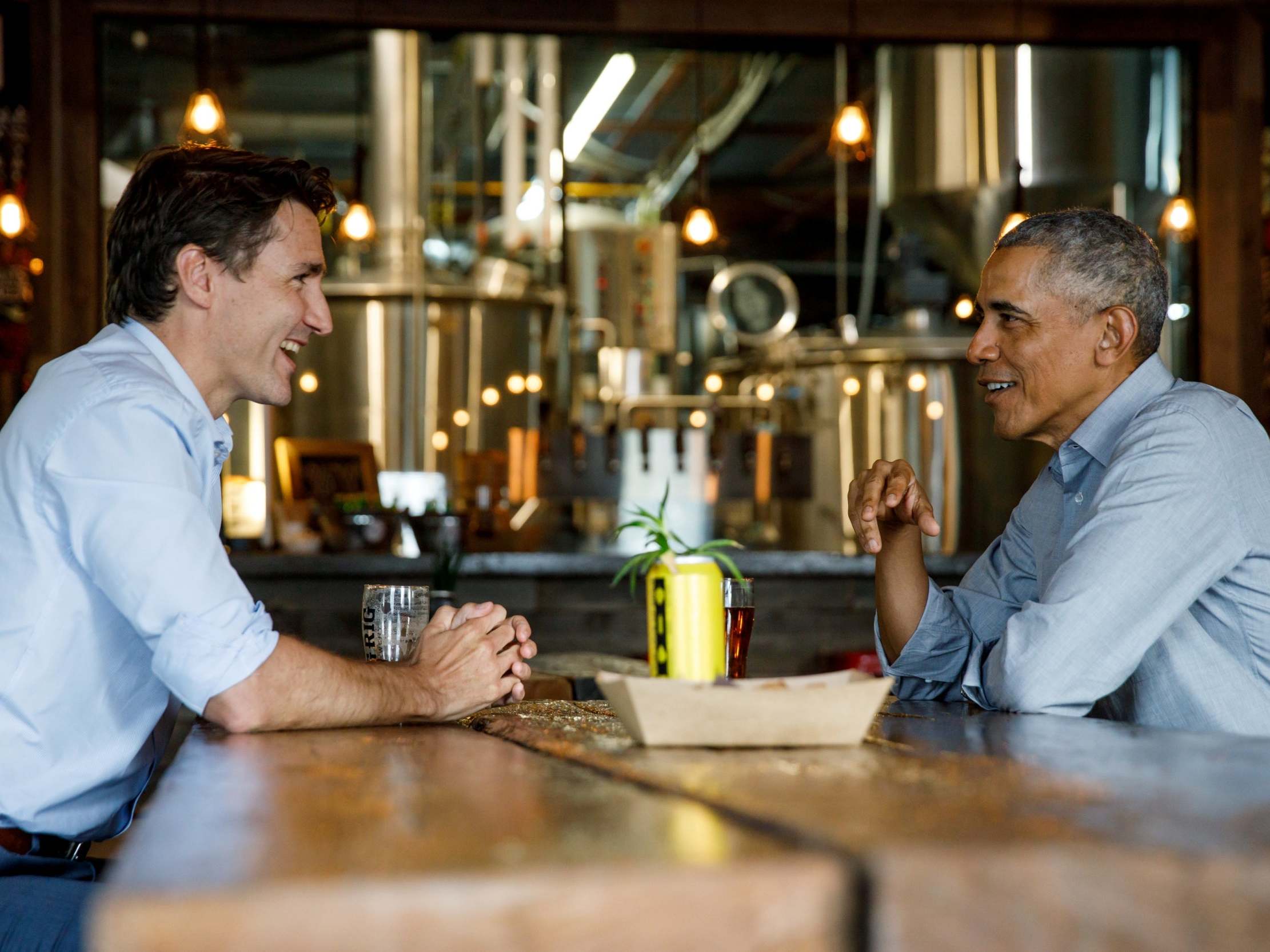 Barack Obama, pictured here at an Ontario brewery with Justin Trudeau in May, said 'the world needs his progressive leadership now'