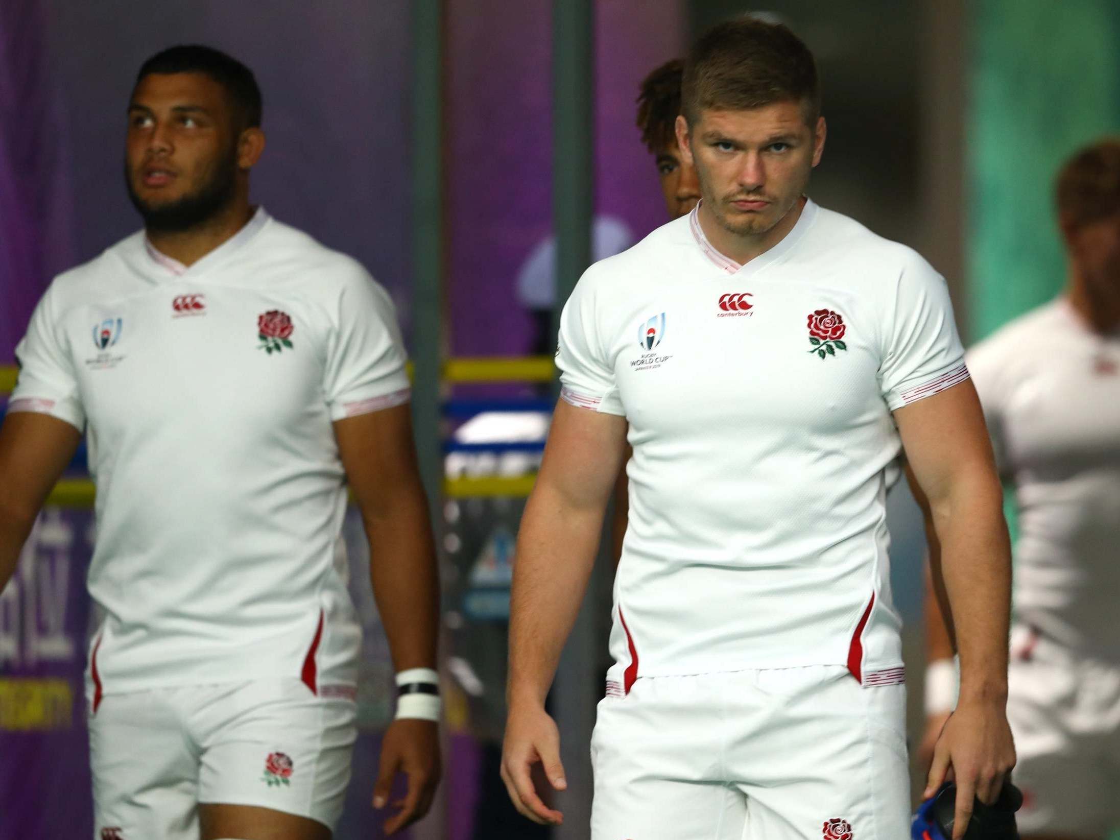 Owen Farrell the captain of England emerges from the tunnel