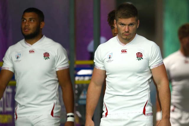 Owen Farrell the captain of England emerges from the tunnel