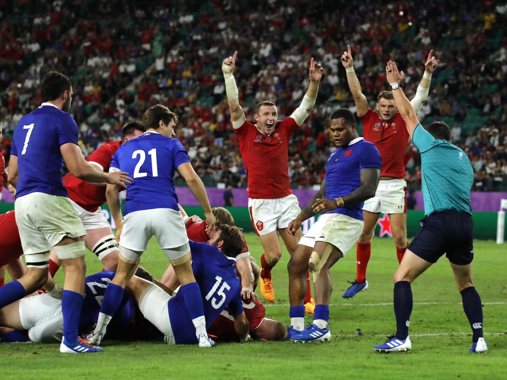 Wales celebrate as Ross Moriarty scores their crucial try