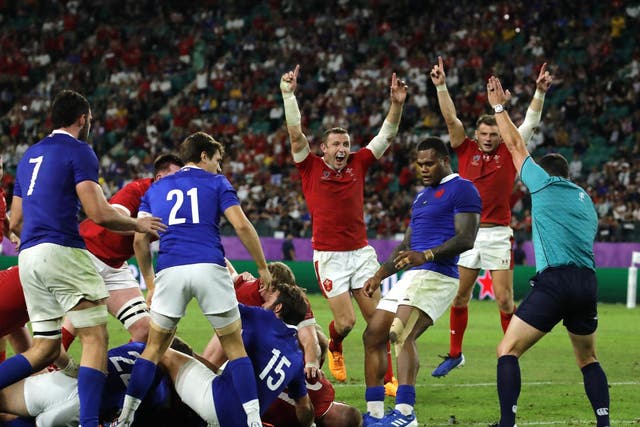 Wales celebrate as Ross Moriarty scores their crucial try