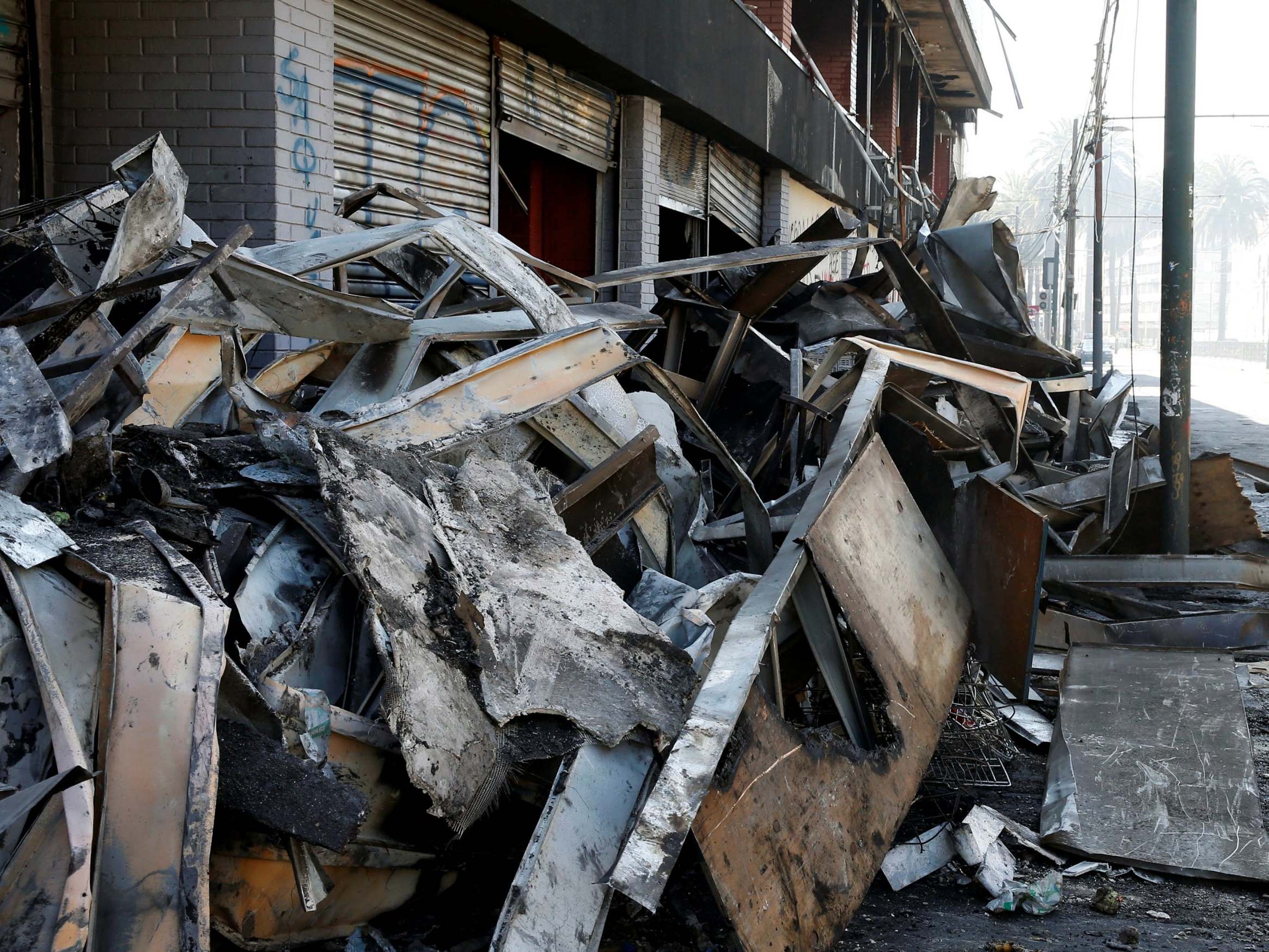 Debris of a burnt and looted supermarket in Chile