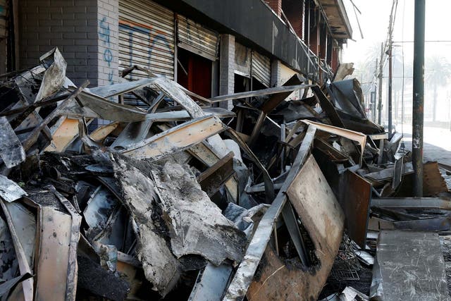 Debris of a burnt and looted supermarket in Chile