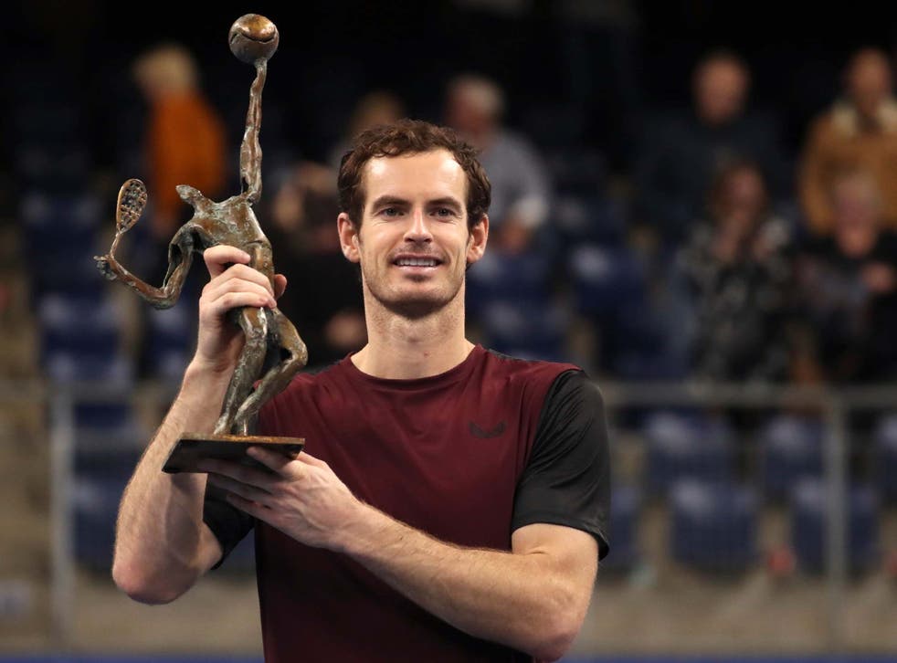 Andy Murray celebrates with the trophy