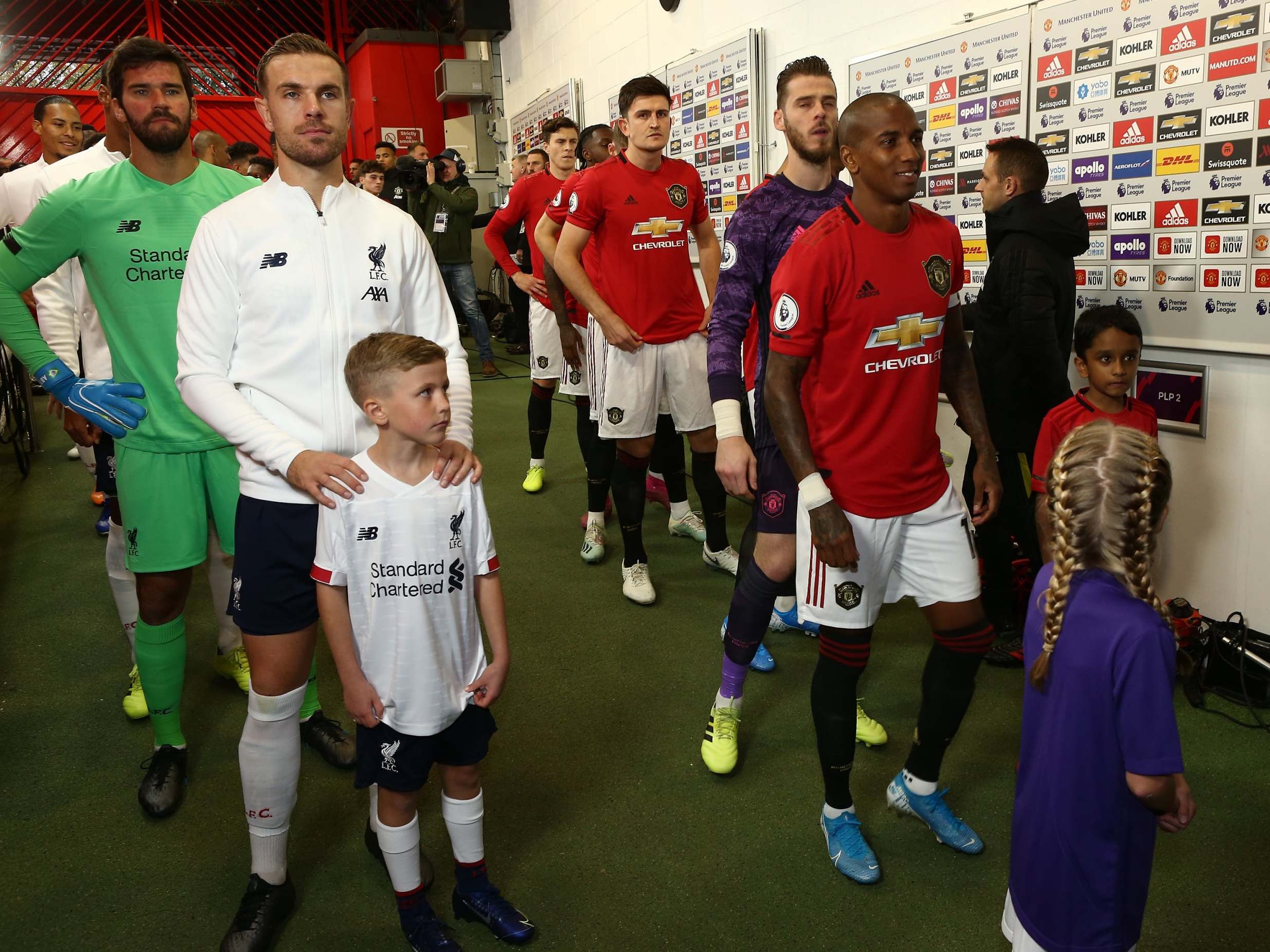 Manchester United and Liverpool line up in the tunnel ahead of kick-off