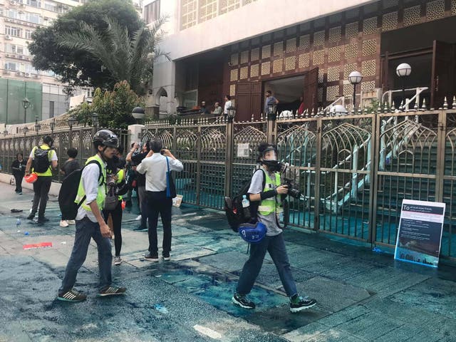 Members of the press are seen outside the Kowloon Masjid and Islamic Centre in Hong Kong, China