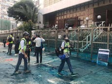 Hong Kong’s leader apologises after police fire blue dye at mosque