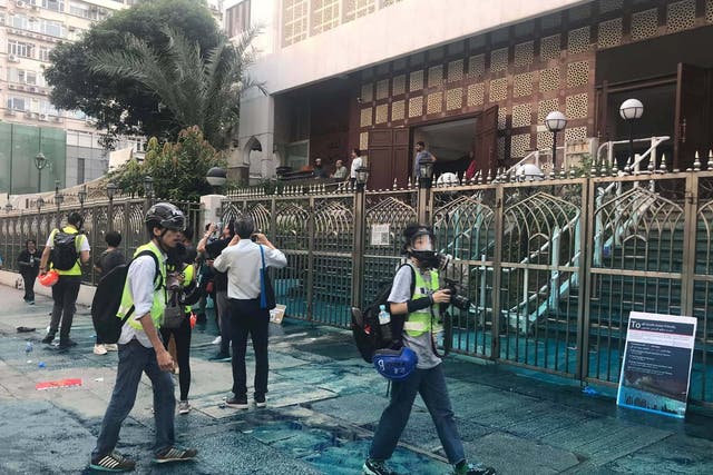 Members of the press are seen outside the Kowloon Masjid and Islamic Centre in Hong Kong, China