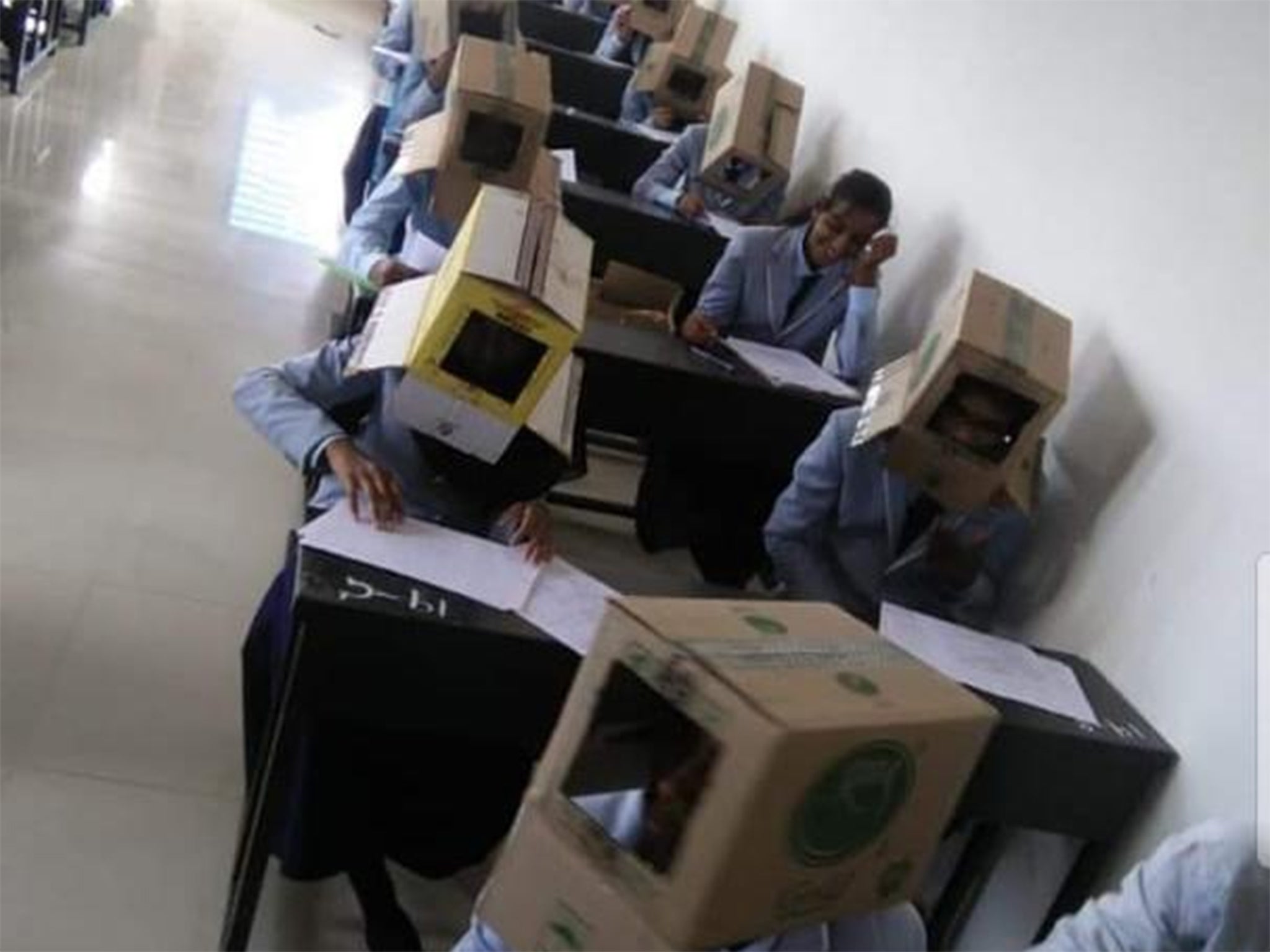 A junior college administrator said the students had consented to wearing the boxes and even brought their own