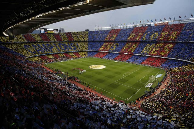 The two sides walk out at the Camp Nou last year