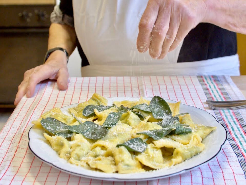 Orecchioni with butter and sage. This dish is made with ravioli filled with many different cheeses (YouTube/Pasta Grannies)