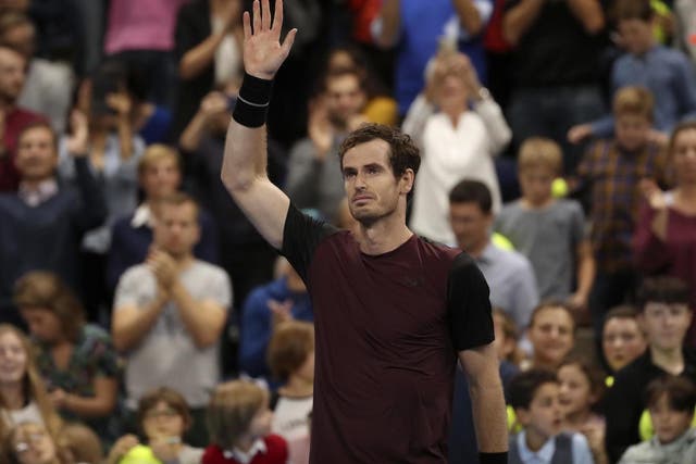 The Scot waves to the crowd in Antwerp after defeating Stan Wawrinka