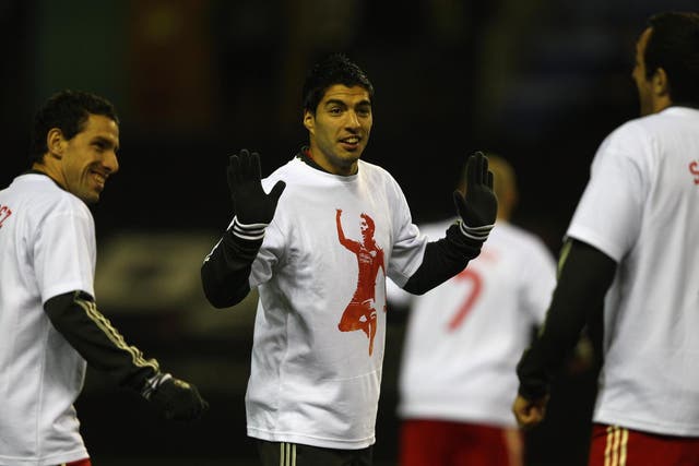 Luis Suarez, sporting the controversial T-shirt Liverpool wore in his support