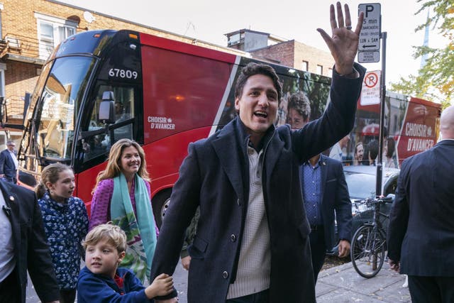 Canadian Prime Minister and Liberal leader Justin Trudeau arrives at the poling station with his son Hadrian, his wife Sophie and daughter Ella-Grace