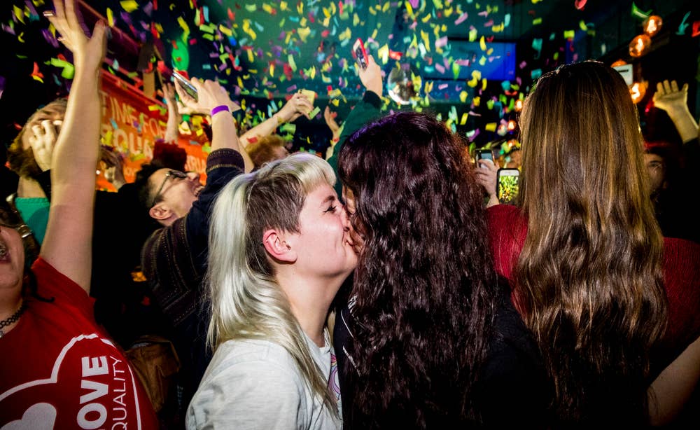 Revellers celebrate equal marriage at Belfast's Maverick Bar