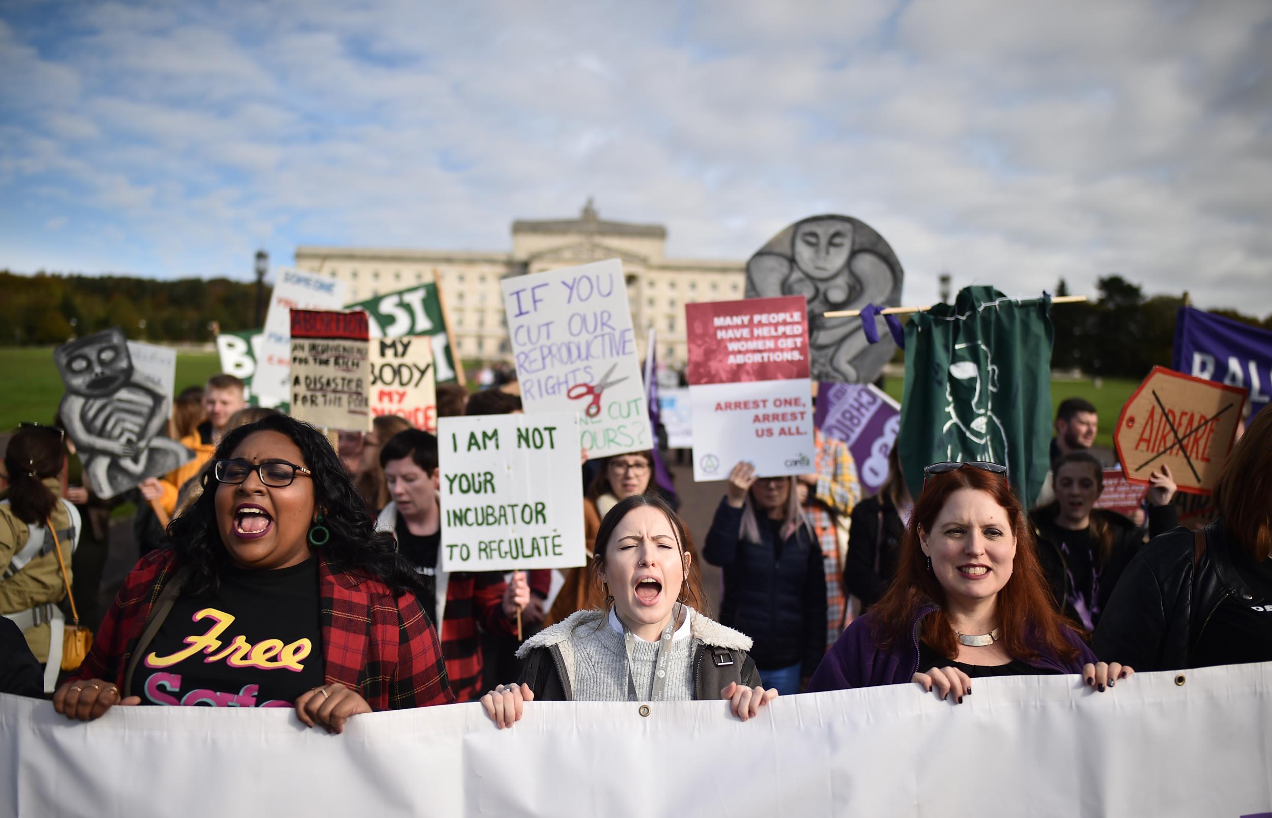 Abortion-rights demonstrators outside Stormont on the eve of the historic law change