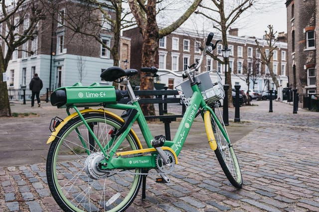 Lime’s brightly coloured fleet of electric-assist bikes parked in the UK in 2018