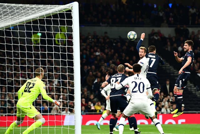 Harry Kane steers home Tottenham's first goal