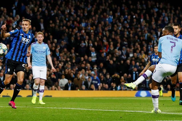 Raheem Sterling fires in Manchester City's third goal