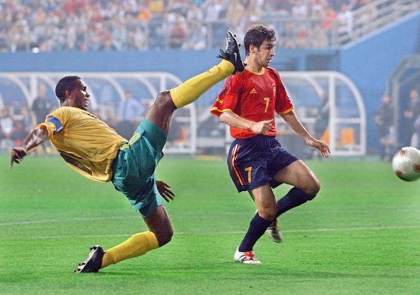 Lucas Radebe tackles Spain’s Raul