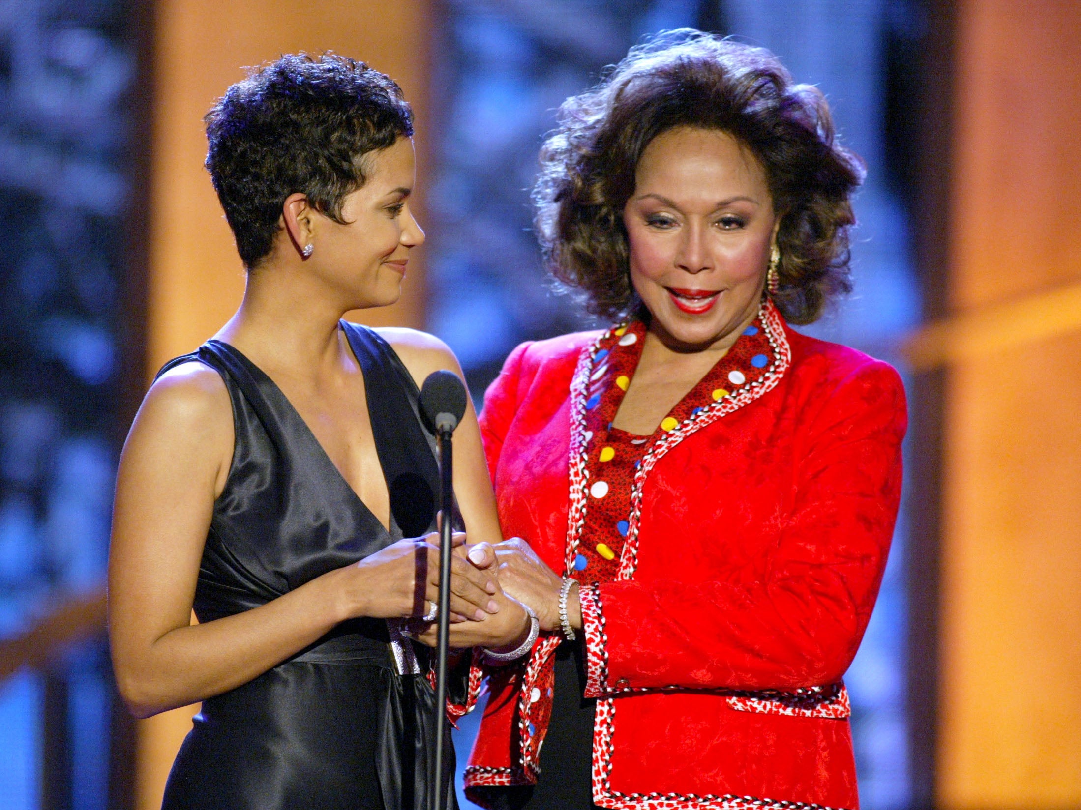 Halle Berry (L) presents Carroll with the Groundbreaking Role Award during the TV Land Awards 2003