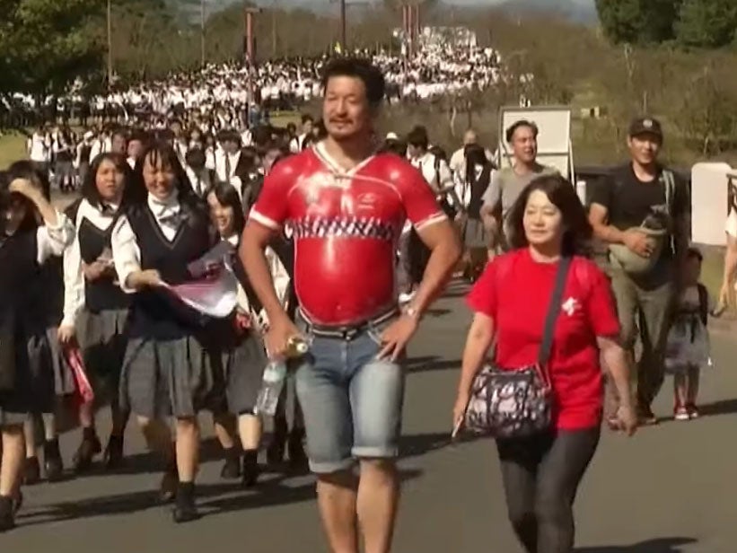 Super-fan Bak-san has hit the headlines for painting rugby shirts on his chest (YouTube)