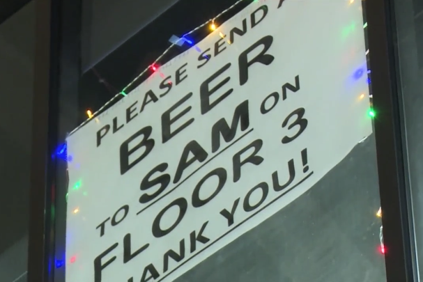 Man has received 85 free beers with office window sign (WNEM)
