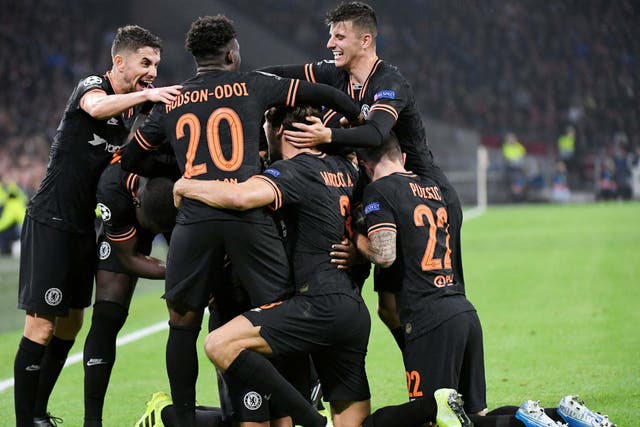 Michy Batshuayi is mobbed by his Chelsea team-mates